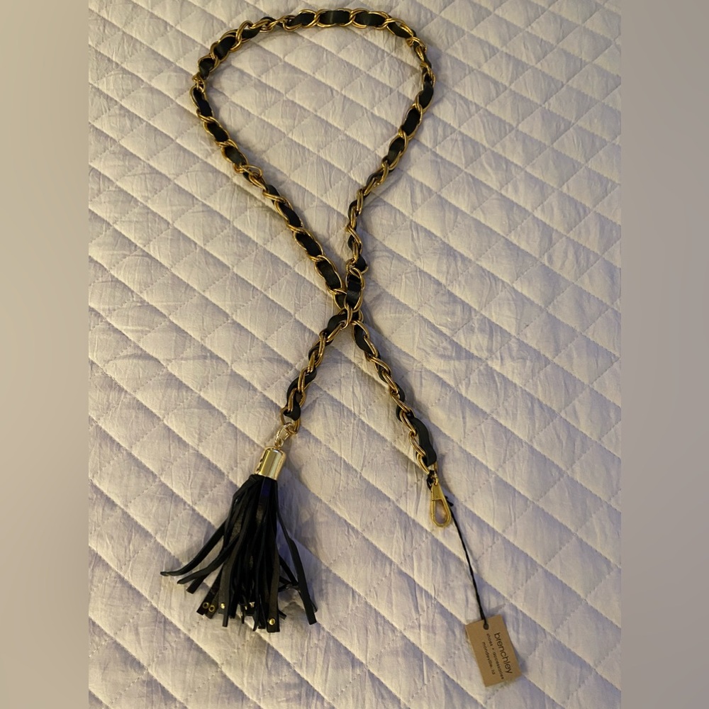 New. Gold and Black Leather chain belt.